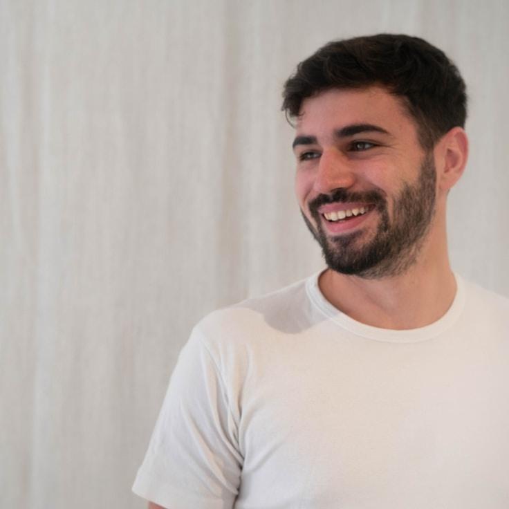 Jordan Patel, Client Relations Director, discussing corporate gifting strategy with business clients